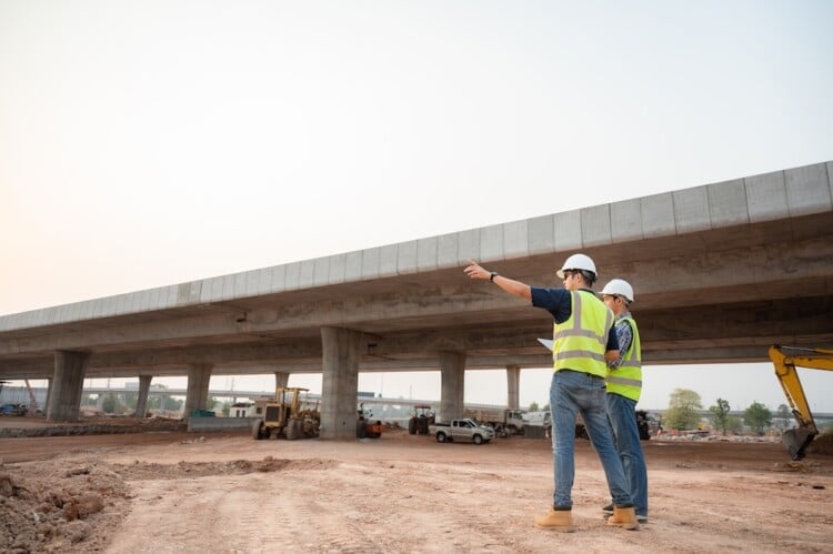 Engineers planning a road project.