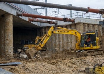 Underpass excavation breakthrough beneath the rail line
